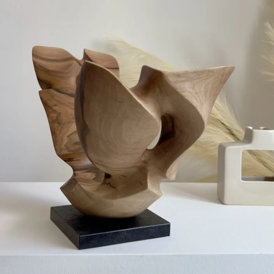 Hand carved walnut wood sculpture Open Arc on black granite base by Ewelina Glowacz