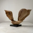 open-arc-walnut-wood-sculpture-front-view-ewebohome-ewelina-glowacz Front view of Open Arc hand carved walnut wood sculpture on granite base