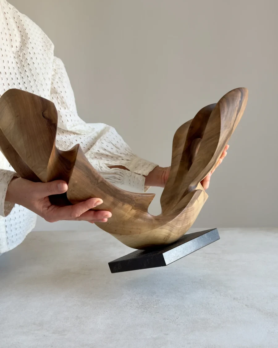 open-arc-walnut-wood-sculpture-hand-scale-photo-ewebohome-ewelina-glowacz Open Arc walnut wood sculpture shown in the artist's hands for scale