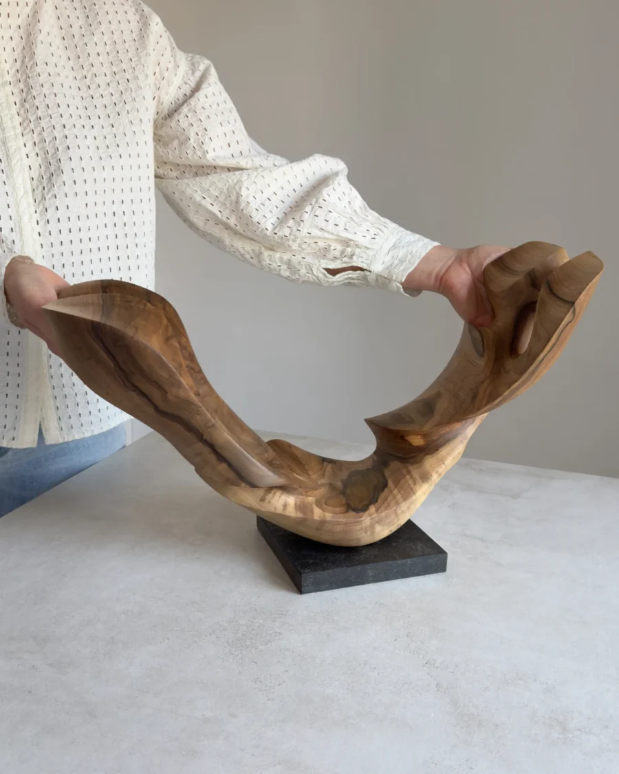 opent-arc-walnut-wood-sculpture-scale-photo-ewebohome-ewelina-glowacz Open Arc walnut wood sculpture shown in the artist's hands for scale