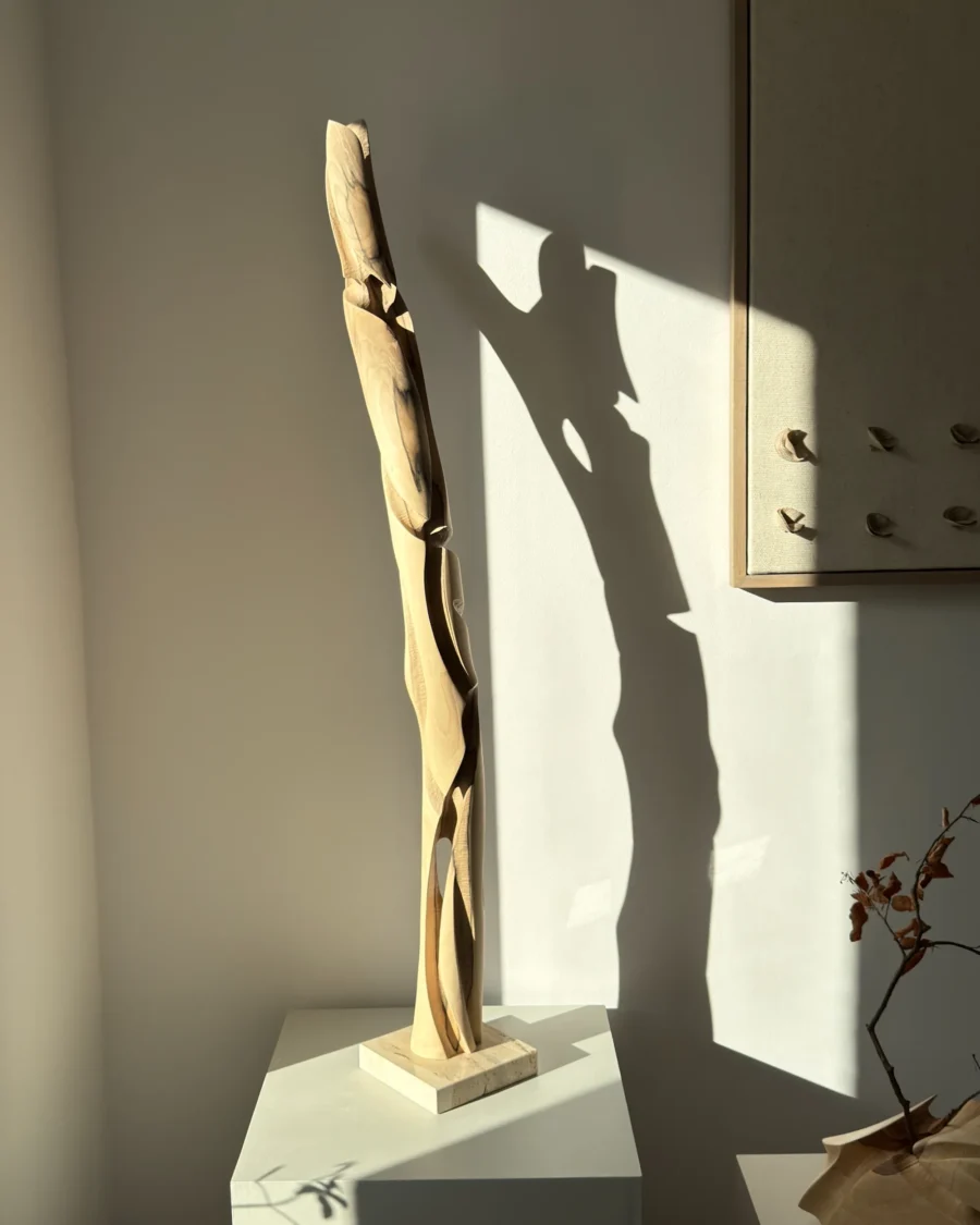 abstract wood sculpture walnut in interior natural light minimalist decor unfolding form