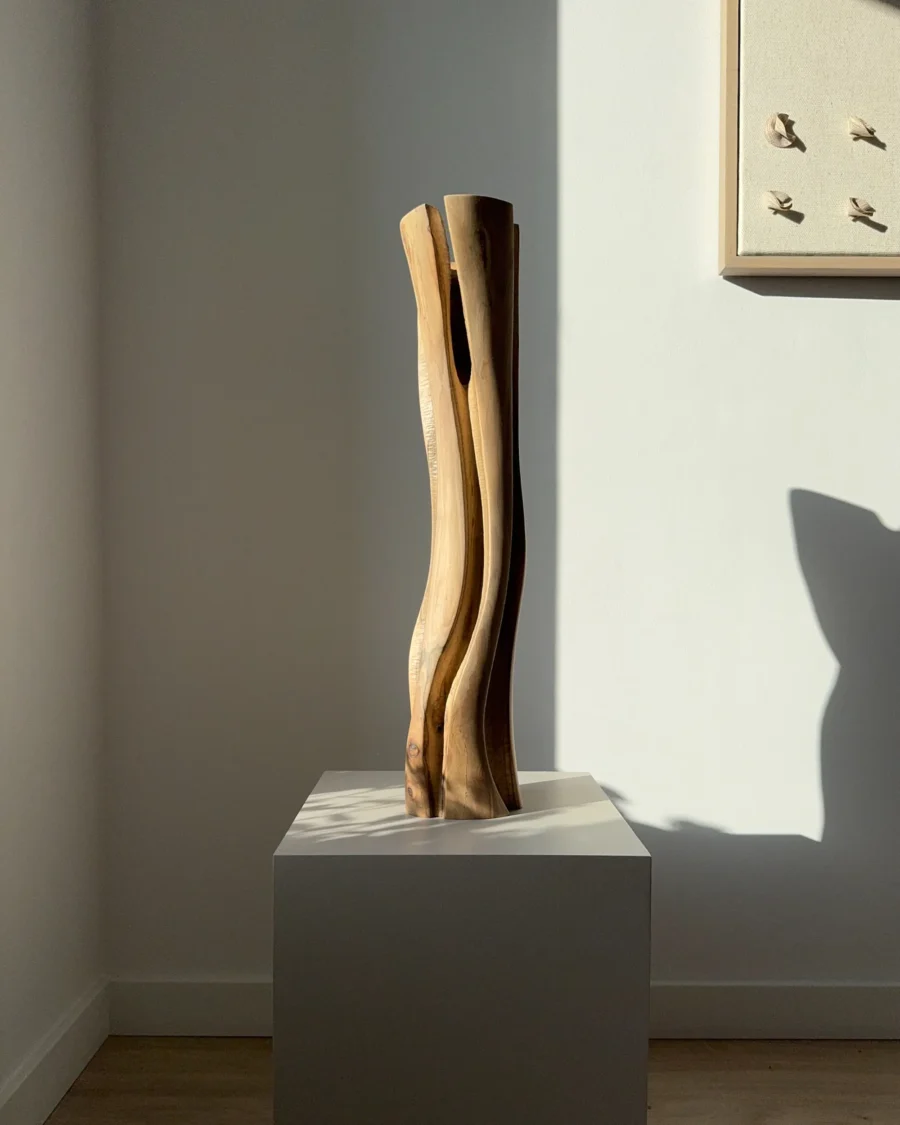 Hand carved walnut wood vase, organic flowing form with natural grain and sculptural vertical shape