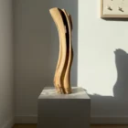 Abstract walnut vase, hand-carved sculptural form with flowing lines and natural wood grain detail