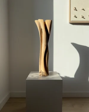 Abstract walnut wood vase, hand-carved from solid wood, tall organic sculptural form in natural light