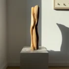 Handmade walnut wood vase, organic asymmetrical form, smooth surface and natural contrast in grain