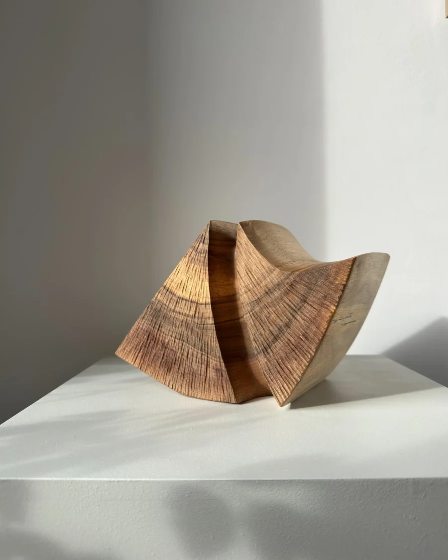 abstract walnut wood vase held fold hand carved sculptural form minimalist object