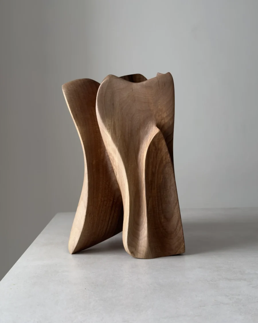 tall abstract wooden sculpture with vertical organic lines, hand carved walnut wood, minimalist sculptural object