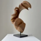 Organic wood sculpture with open form and natural grain, hand-carved from solid walnut