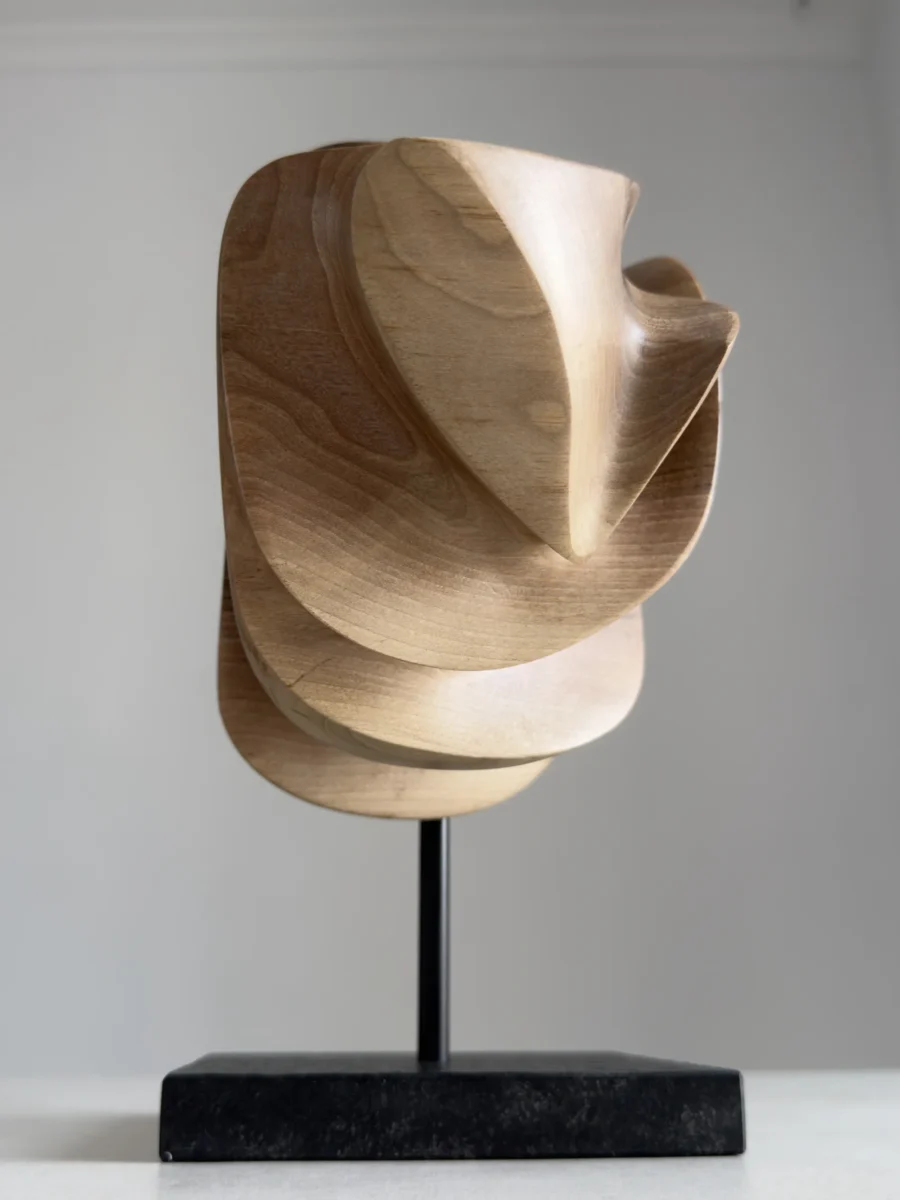 Modern abstract wood sculpture in walnut, full view showing balanced asymmetrical form and clean lines