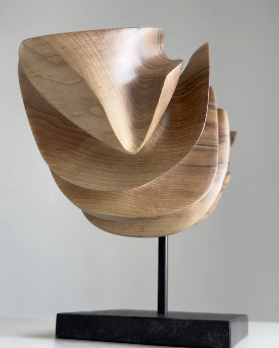 Modern abstract wood sculpture in walnut, full view showing balanced asymmetrical form and clean lines
