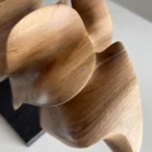 Close up of light walnut surface showing smooth finish and subtle natural grain pattern