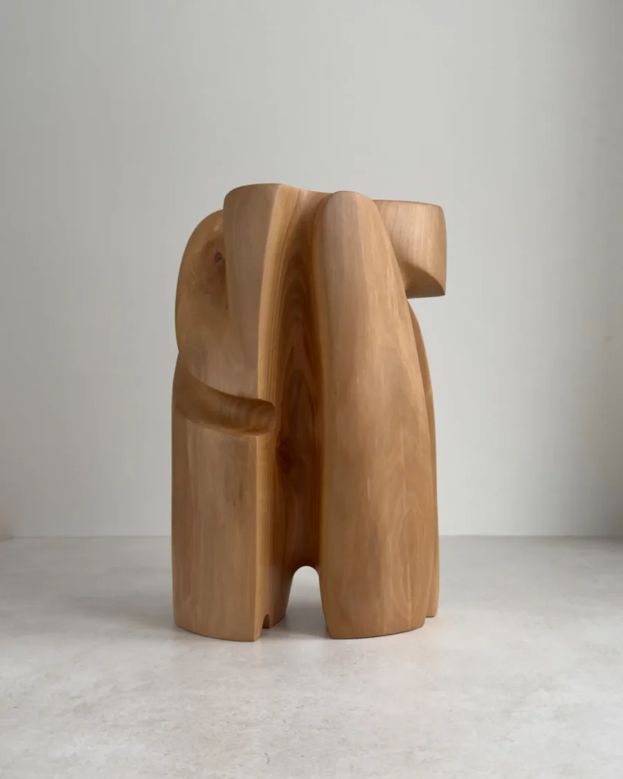 abstract wood sculpture in pear wood Quiet Axis front view minimalist form