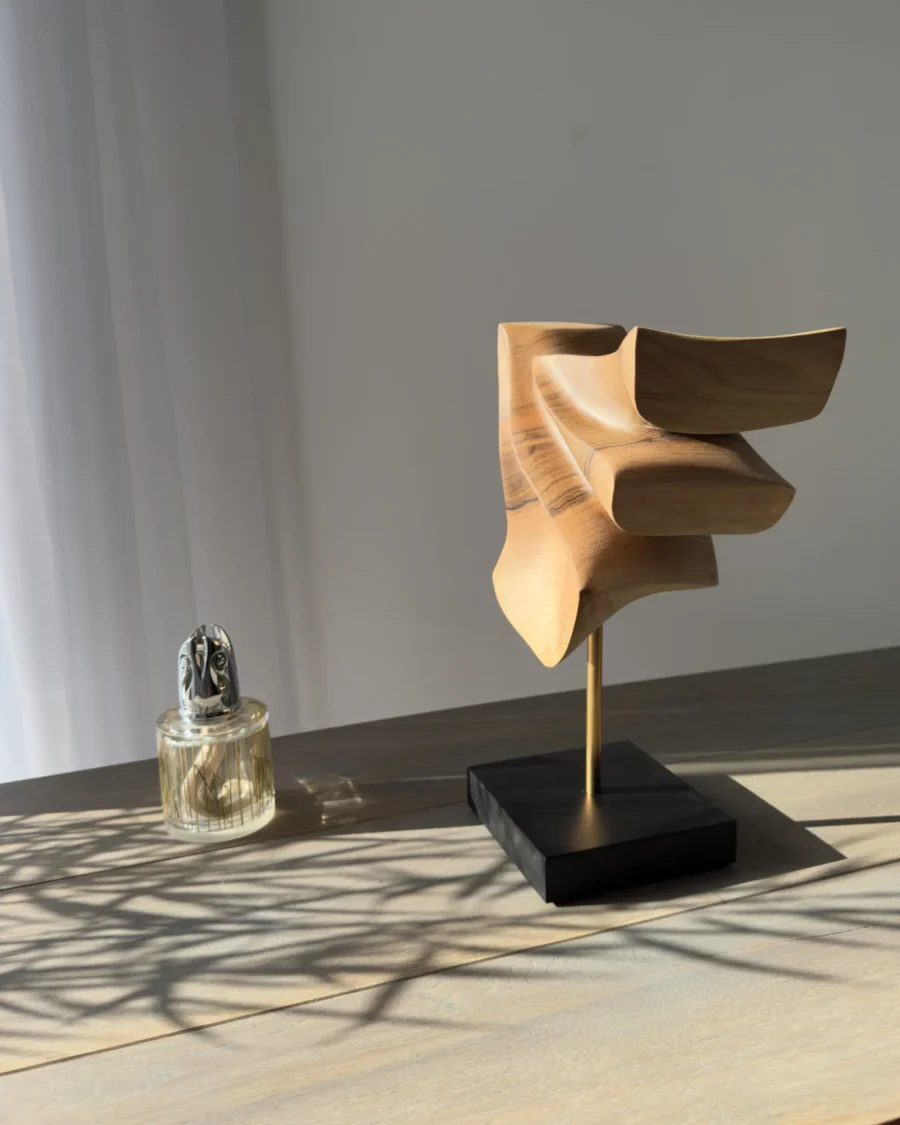 Back view of walnut wood sculpture Velora revealing full 360 degree handcrafted form