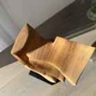 Top view of abstract wood sculpture Velora showing hollowed and flowing internal curves