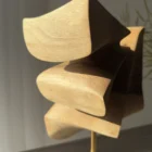 Back view of walnut wood sculpture Velora revealing full 360 degree handcrafted form