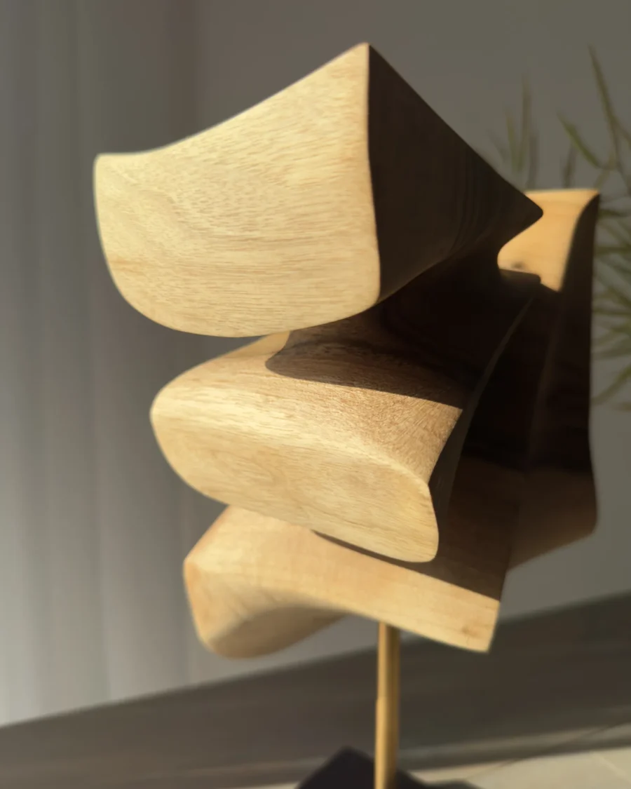 Back view of walnut wood sculpture Velora revealing full 360 degree handcrafted form