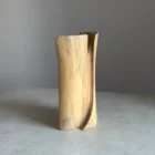Hand-carved walnut vase, abstract wooden form with vertical grain and natural tones