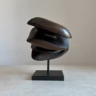black abstract wood sculpture different angle showing movement