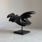 modern handmade wooden sculpture dark finish minimalist interior