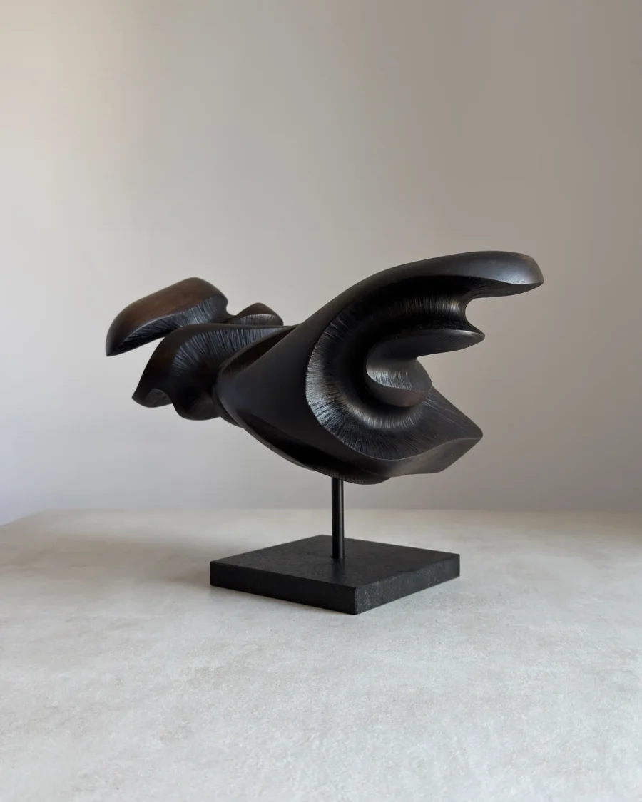 modern handmade wooden sculpture dark finish minimalist interior