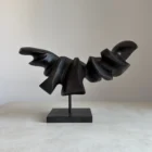 abstract wood sculpture black pear wood on granite base front view