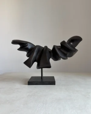 abstract wood sculpture black pear wood on granite base front view