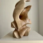 Hand carved walnut wood sculpture with flowing organic shape – modern abstract wooden art object