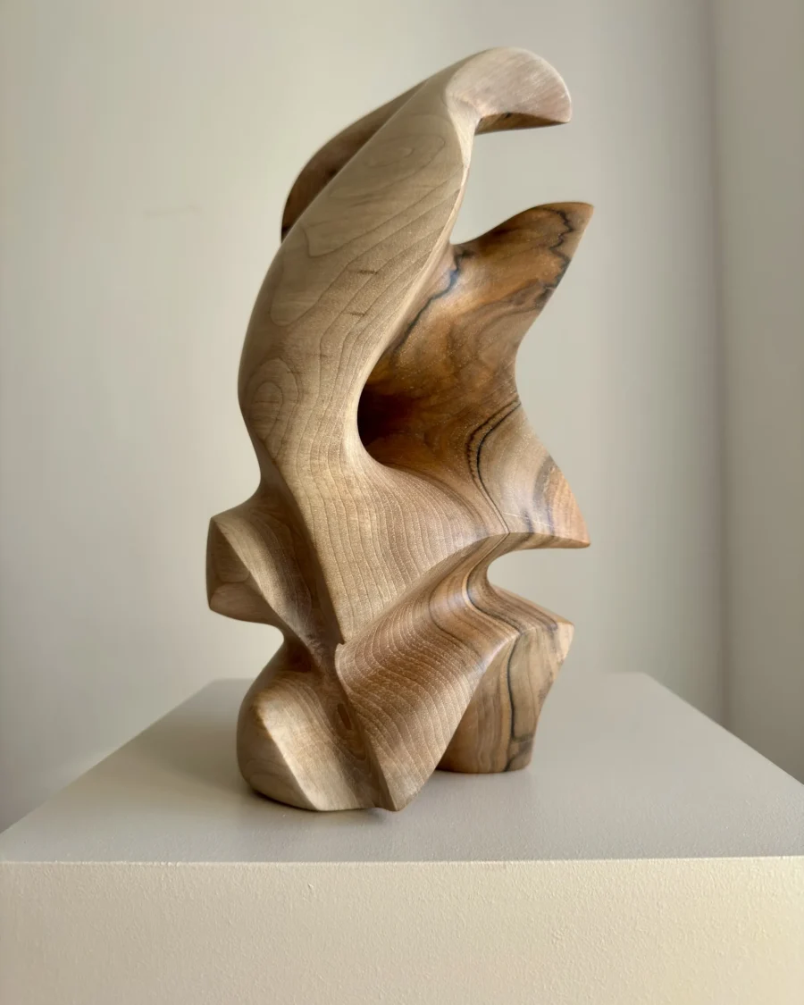 Hand carved walnut wood sculpture with flowing organic shape – modern abstract wooden art object