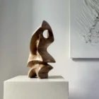 Hand carved walnut wood sculpture with flowing organic shape – modern abstract wooden art object by Ewebohome