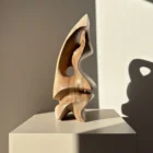 Modern abstract wooden sculpture with dynamic form and soft curves – solid walnut, one of a kind