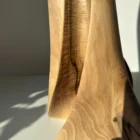 abstract-wood-vase-light-shadow-detail abstract wood vase detail with light and shadow creating depth on the surface