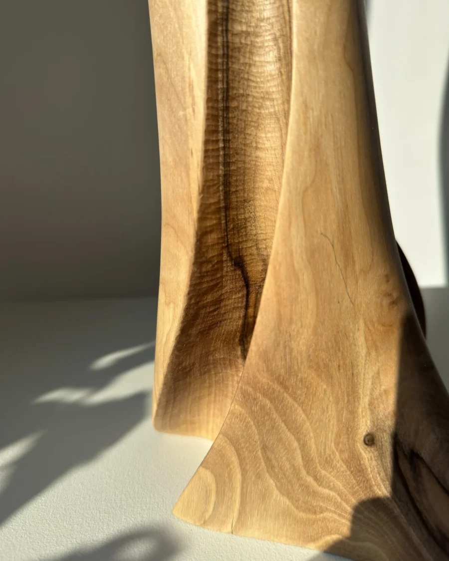 abstract-wood-vase-light-shadow-detail abstract wood vase detail with light and shadow creating depth on the surface