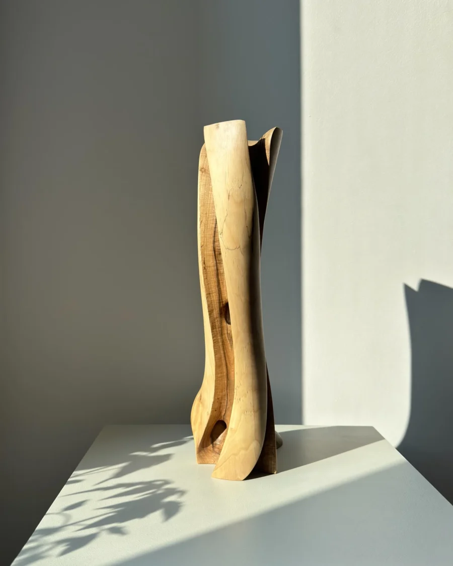 abstract-wood-vase-walnut-leaning-form-main abstract wood vase hand carved from walnut with a subtle leaning form in natural sunlight