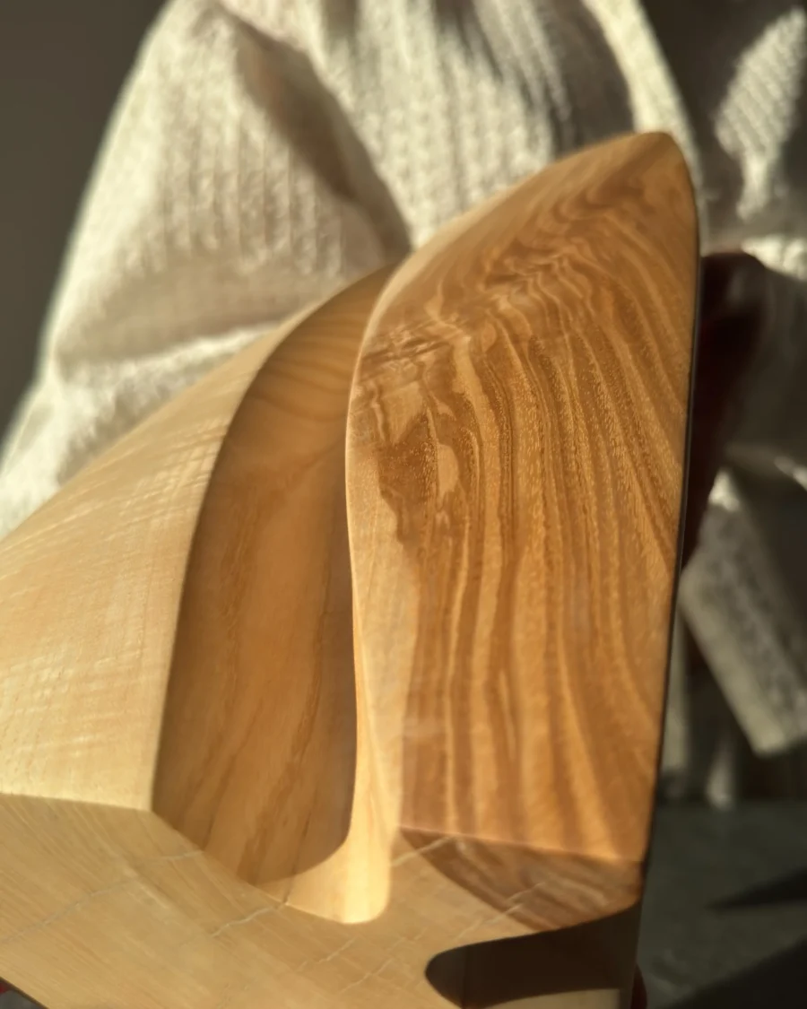 Close up of ash wood grain in hand carved vase, natural pattern and texture