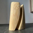 Abstract ash wood vase side view, sculptural wooden form, minimal design