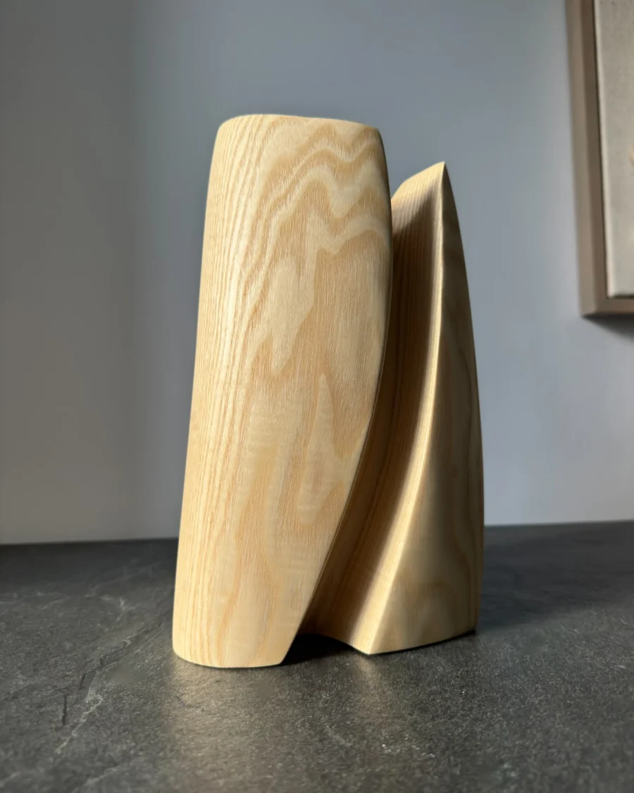 Abstract ash wood vase side view, sculptural wooden form, minimal design