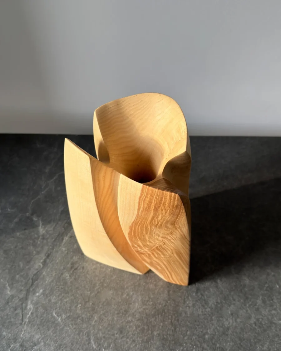 Top view of ash wood vase, hollow interior carved from solid wood