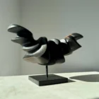 Reverse view of Dark Expansion abstract wood sculpture with flowing curves, textured recesses and matte black finish