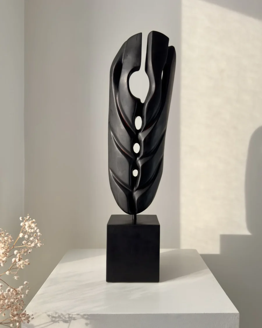 ember-guardian-abstract-wood-sculpture-front Abstract black wood sculpture Ember Guardian front view on pedestal