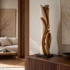 Maple sculpture placed in minimalist interior setting