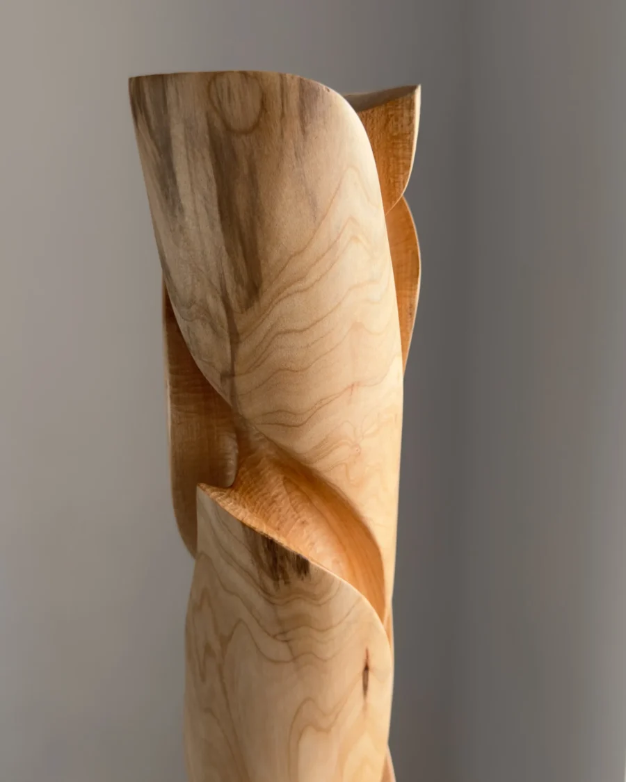 Detail of maple wood grain and smooth carved surface