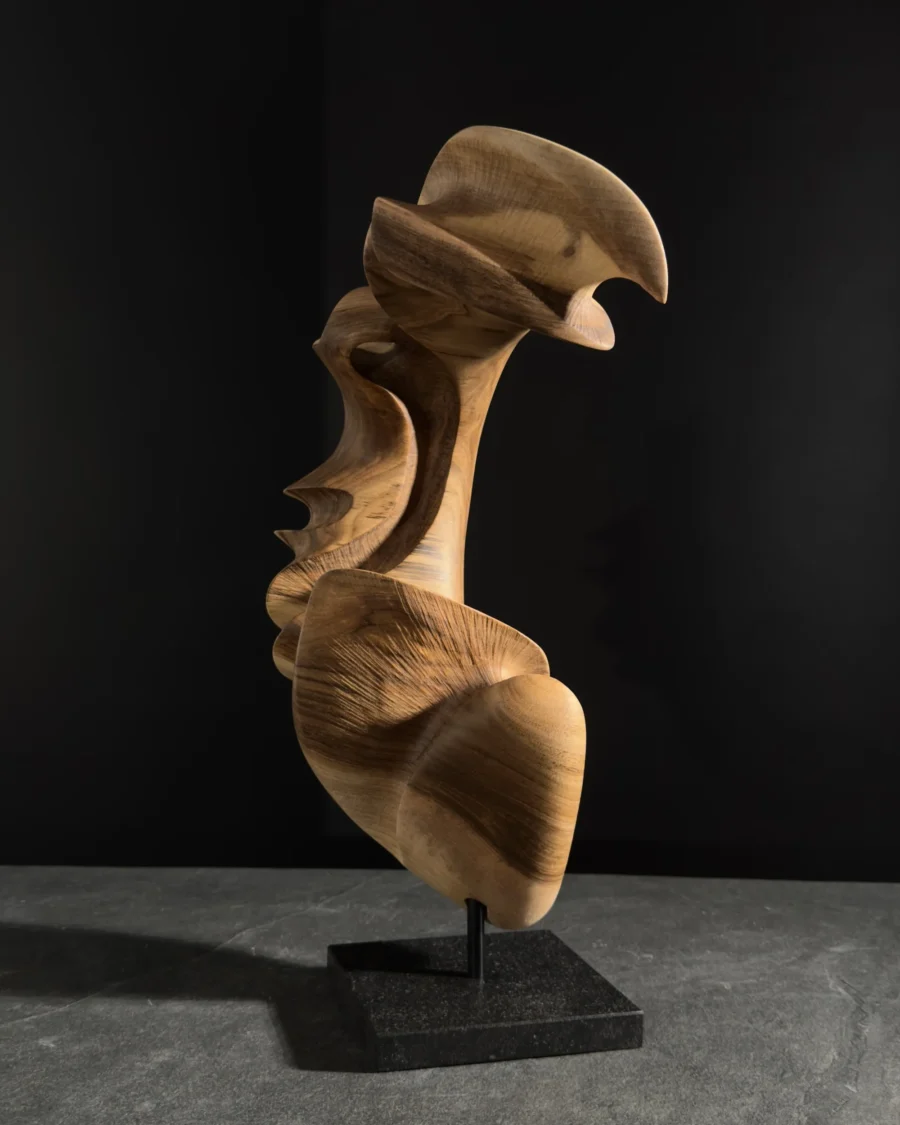 quiet-arc-walnut-sculpture-front-view Back view of abstract walnut sculpture, hand carved wood form showing natural grain and soft sculptural transitions