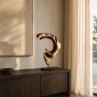 quiet-arc-walnut-wood-sculpture-ewebohome-ewelina-glowacz 2 walnut wood sculpture in minimalist modern intreior i natural light in front of window