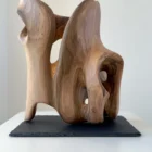 rebirth-sculpture-light-shadow-ewebohome Hand-carved walnut wood sculpture “Rebirth” mounted on a natural slate base
