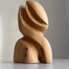 compact wooden sculpture Seed Form side view soft natural tones
