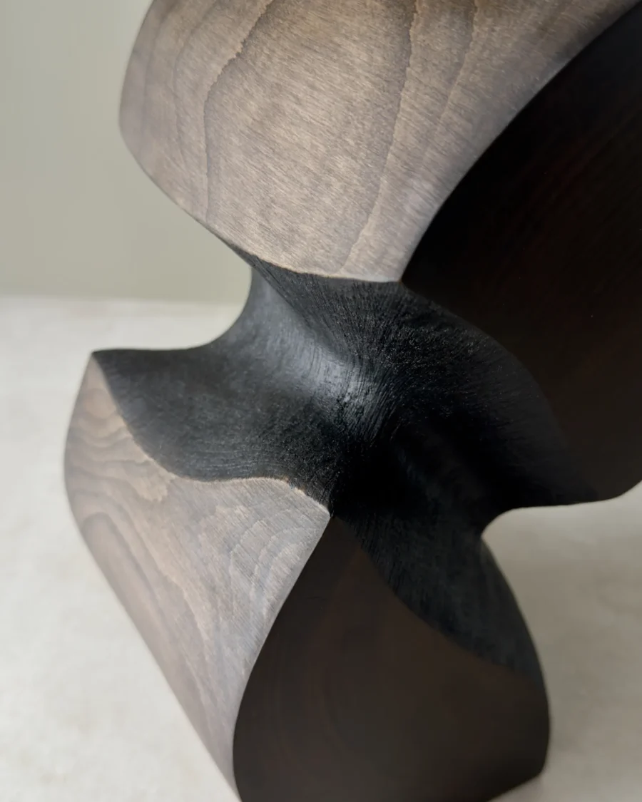 close up apple wood vase yakisugi charred texture and smooth surface contrast