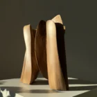 threefold-balance-contemporary-wood-sculpture-profile Rear angle of abstract walnut sculpture with sculptural openings and curved surfaces