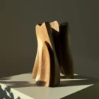 threefold-balance-walnut-sculpture-light-shadow Abstract walnut wood sculpture styled for Japandi and modern organic interiors