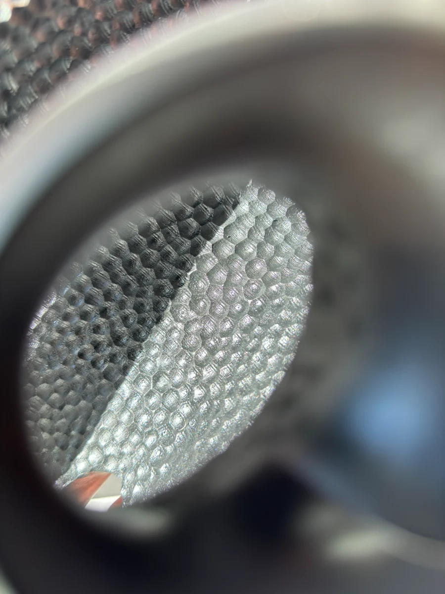 inner-tension-detail-texture-core Close-up of apple wood grain and smooth surface transitions