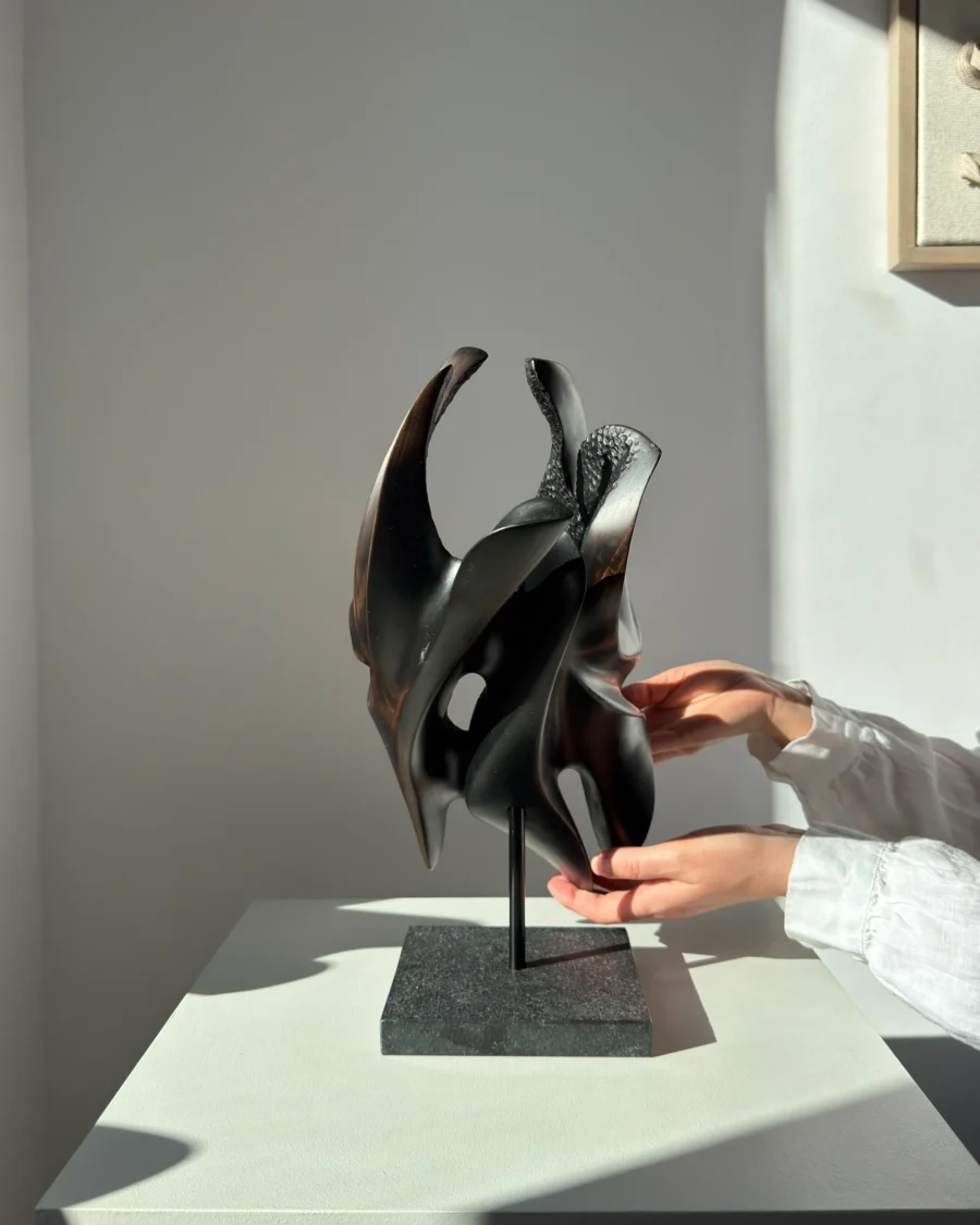 inner-tension-sculpture-in-hand Sculpture held in hands, showing size and craftsmanship